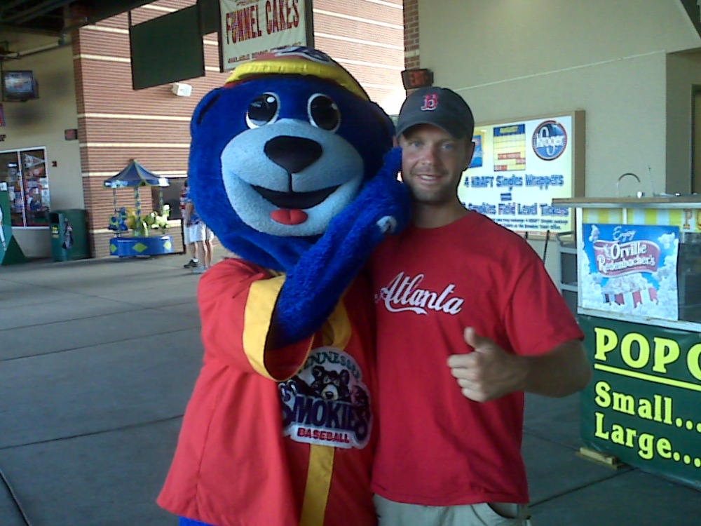 A friend with one of the Smokies mascots, Slugger or Diamond